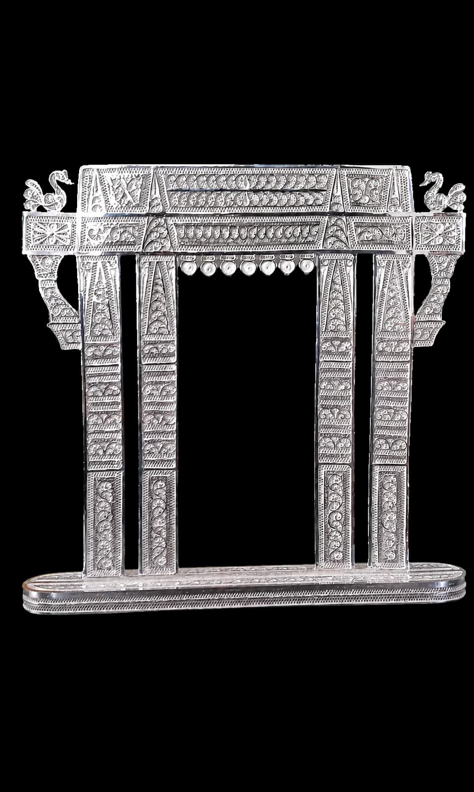 Tall arched silver filigree frame with temple-inspired ornament