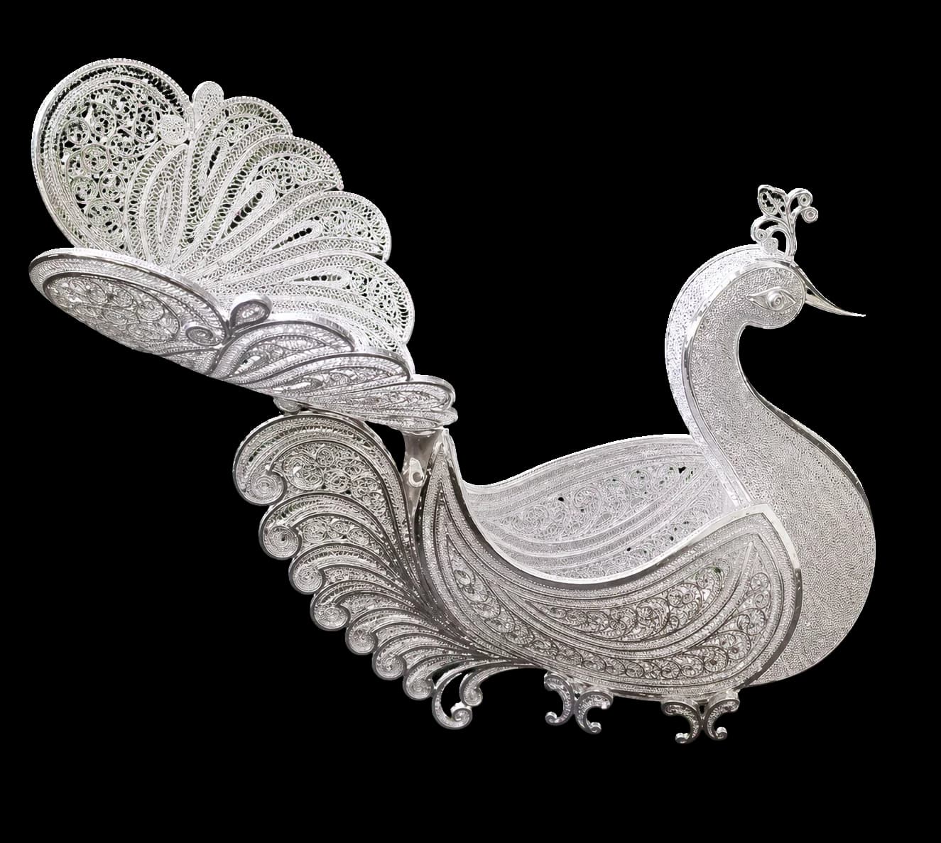 Large silver filigree peacock sculpture with layered open-wire tail feathers