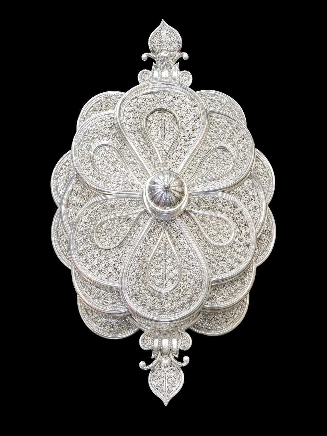 Tall flower-shaped silver filigree container on a round base