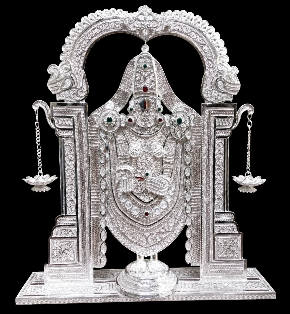 Balaji figure presented within an ornate silver filigree shrine